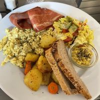Scrambled tofu, vegan bacon, toasts and vegetables   at Radikalecker in Berlin