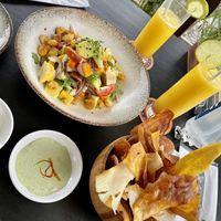 Vegan ceviche, mango juices and yuca and sweet potato chips.  at Lima Cocina Peruana in Rio De Janeiro
