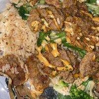 Asian fried chicken over spicy rice and broccoli  at Vegan Heat in Duncanville