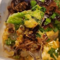 Chopped BBQ rib loaded baked potato at Vegan Heat in Duncanville