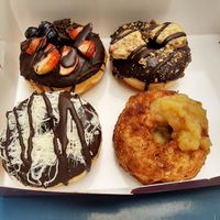Vegan donuts (strawberry, cookie, cotton candy, apple compote) at Royal Donuts in Zurich