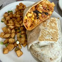 Bruncherito with breakfast potatoes  at Cafe Olympic in Crystal Lake