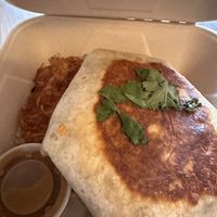 Crunchwrap with hashbrowns   at The Nucleus in Eau Claire