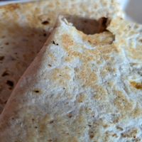 Quesadilla - vegan chorizo, roasted red pepper, caramelized onion, kale, chipotle aioli, vegan queso at Galaxy Hut in Arlington