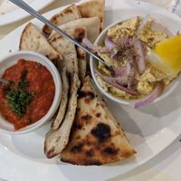 Yellow Lentil and Roasted Red Pepper Dip with Fresh Warm Pita at Blu Kouzina in Sarasota