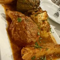 Stuffed zucchini pepper tomato and baked potato's  at Blu Kouzina in Sarasota