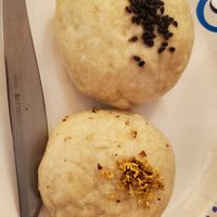 top tofu kale bun, bottom red bean bun at Cai's Dim Sum Catering in Brattleboro