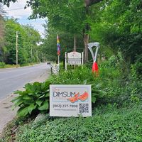Front sign at Cai's Dim Sum Catering in Brattleboro