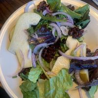 Vegan pear and walnut salad - started eating before I took the pic…looked better when I got it lol   at Wally's Pizza Bar in Cameron Park