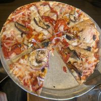 Vegan pizza with mushrooms, peppers, and onions   at Wally's Pizza Bar in Cameron Park