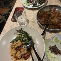 Already ate half the meal but we got the crispy tofu, potato bravados, and san choy bow  at Monster Kitchen and Bar in Canberra