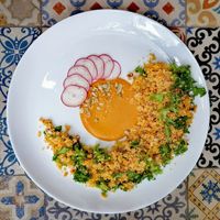 Ensalada de cucus con quinoa, lechuga escarola y pipian at Coral Restaurante in Cozumel