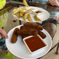 Faux mozzarella sticks and potato wedges   at Coral Restaurante in Cozumel