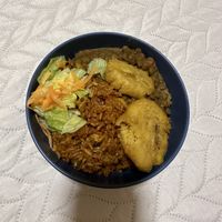 Rice with veggies and lentils + fried plantain   at Los Delfines in Puerto Villamil