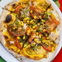 Veggie pizza without cheesee  at Los Delfines in Puerto Villamil