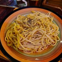 Tomato pasta with extra olives and corn apparently? at Los Delfines in Puerto Villamil