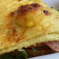 Eggs benedict “yolk" at Brunch Bird in Austin