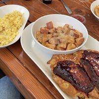 Stuffed Frenchie with gravy pots abs side of scrambles    at Brunch Bird in Austin