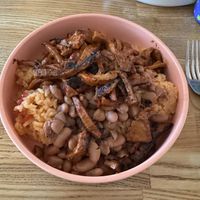 Burrito Bowl with Al pastor and sauces on the sidee  at Rascal's in Santa Barbara
