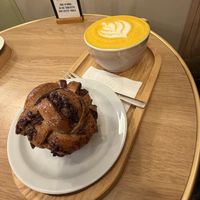 Chocolate Bun and turmeric latte   at Graines du Jour in Paris