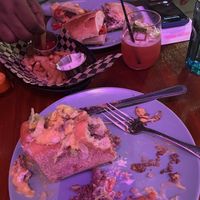 Chopped cheesesteak ( sorry we were halfway) truffle parmesan fries , fried chicken cutlet sandwich   at Monster Vegan in Philadelphia