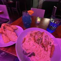 Garlic Bread, Alfredo with chickN protein, Alcoholic drink    at Monster Vegan in Philadelphia