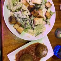 Caesar salad and fried mac and cheese balls   at Monster Vegan in Philadelphia