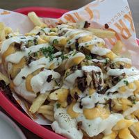 Four Cheese Bacon Loaded fries 🍟 vegan at Carrots The Vegan Kitchen in Bangkok