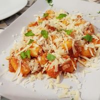 Gnocchi com molho de tomate e parmesão Vegan at Gastronomia Italiana in Cascais