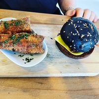 The Sweet & Smoky burger with sweet potato samosas   at Seitan's Corner in Bristol