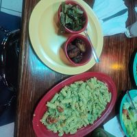 Collard greens, plantains  and Rasta Pasta at Red Stripes Caribbean Cuisine & Lounge in Hilton Head Island