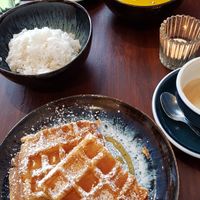 Pumpkin soup with jasmine rice, Belgian waffle with maple syrup at Mono Cafe in Munich