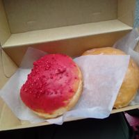 The raspberry filled donut was so good....bees were attracted to it too at Sammy's Berliner Donuts in Berlin