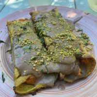 Canelones de calabaza y choclo con salsa de hongos (Menú del día)  at Inhala Bar Natural in Funes