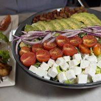 Salad with chicken skewer  at Willow Vegan Bistro in New York City