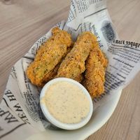 Vegan deep fried pickles with vegan dip at Fionn's in Winnipeg