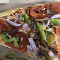 Vegan Toppers Classic with additional toppings: garlic-roasted tomatoes and fire-roasted jalapeños   at Toppers Pizza - South Blvd in Charlotte