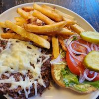 Vegan burger, vegan cheese added on, and fries at Zim's Cafe in Lexington