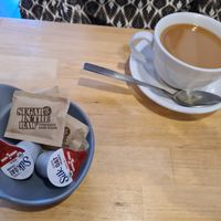 Coffee with oat milk & raw cane sugar at Spacecat V-stro in Ferndale