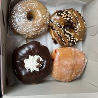 French toast, Snickers, mocha frappe, and strawberry filled  at Donut Run in Washington