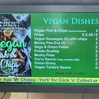 Vegan menu - if you can’t see it on display, wait a few minutes as it cycles with adverts.   at Mr Chippy in York