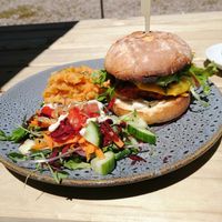 Burger, served with sweet mash and salad at Moon To Moon in Mount Victoria