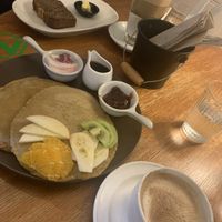 Pancakes with rose jam and coconut yoghurt. Banana bread w vegan butter   at Moon To Moon in Mount Victoria