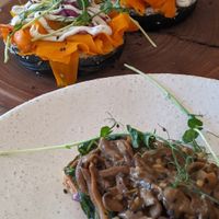 "Salmon" carrot beagle & oyster mushroom bread at The Conscious Kitchen - Kloof St in Cape Town