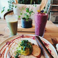Avo toast with added sausage and brasilian blast smoothie at The Conscious Kitchen - Kloof St in Cape Town