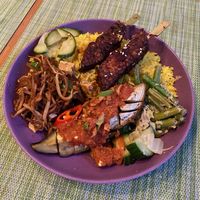 This is the medium nasi rames dish, that includes a basis, 2 veg items (like tempeh) and 1 vegetable option. at Indo Food House in Utrecht