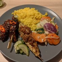 Saté tempeh, Terong balado and Sajoer lodeh with Nasi kuning at Indo Food House in Utrecht