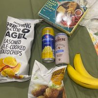 Crisps, limonata, plant based fish, coffee, bananas and falafels   at Trader Joe's in Boston