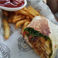 Vegan burrito with fried at Eat Street in Santa Teresa