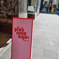 Next to Aesop you find pink neon sign at Pink Neon Sign in Auckland
